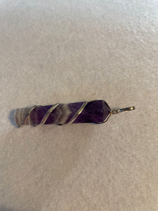 Gorgeous Banded Amethyst Point Pendant is just over 2” and is wrapped in precious silver