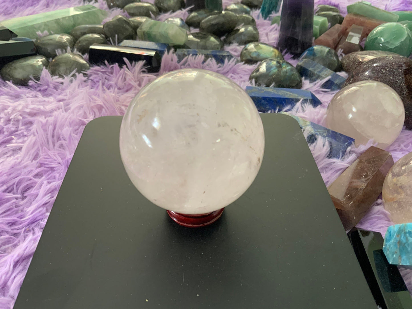 Beautiful 1 pound clear quartz sphere crystal ball with wooden stand