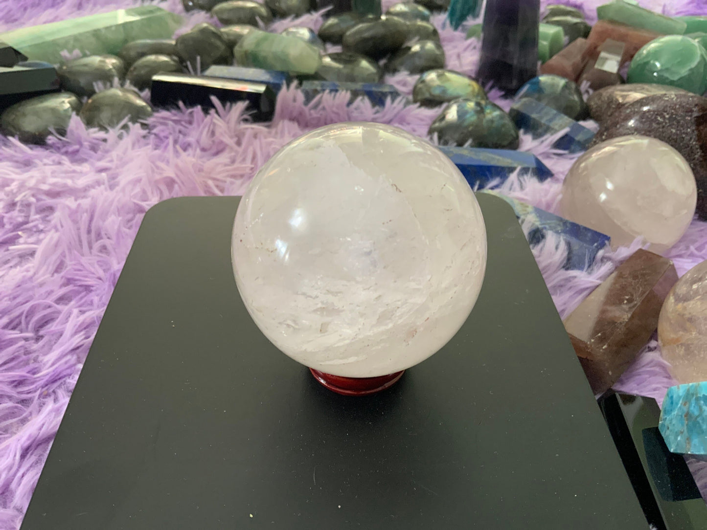 Beautiful 1 pound clear quartz sphere crystal ball with wooden stand