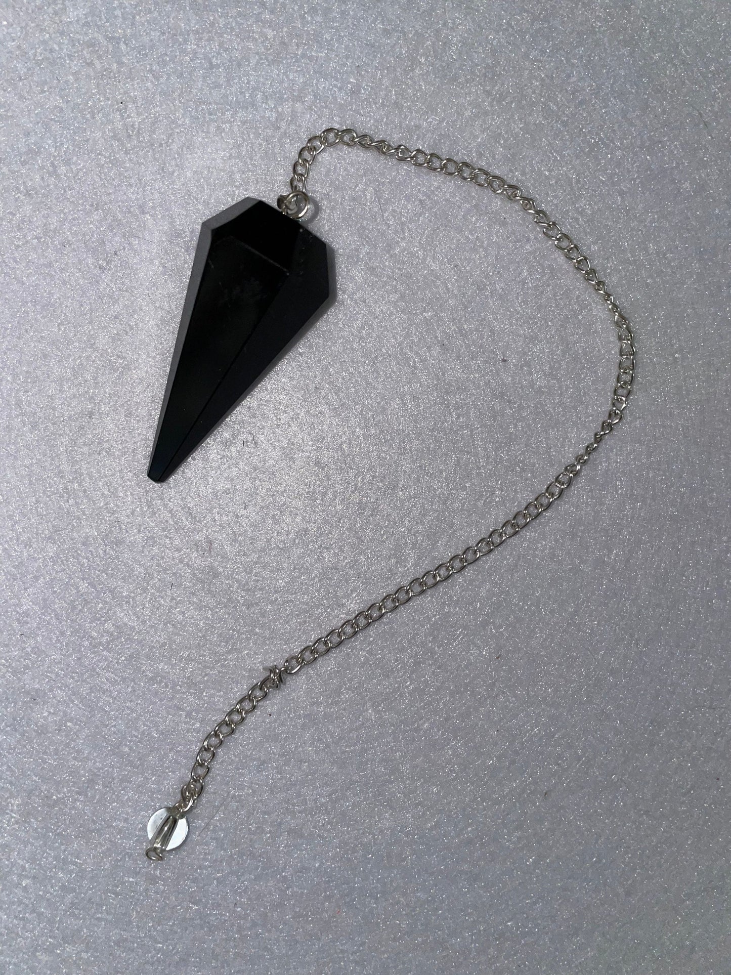 Black Obsidian Pendulum is  1.65” and with chain is 9”