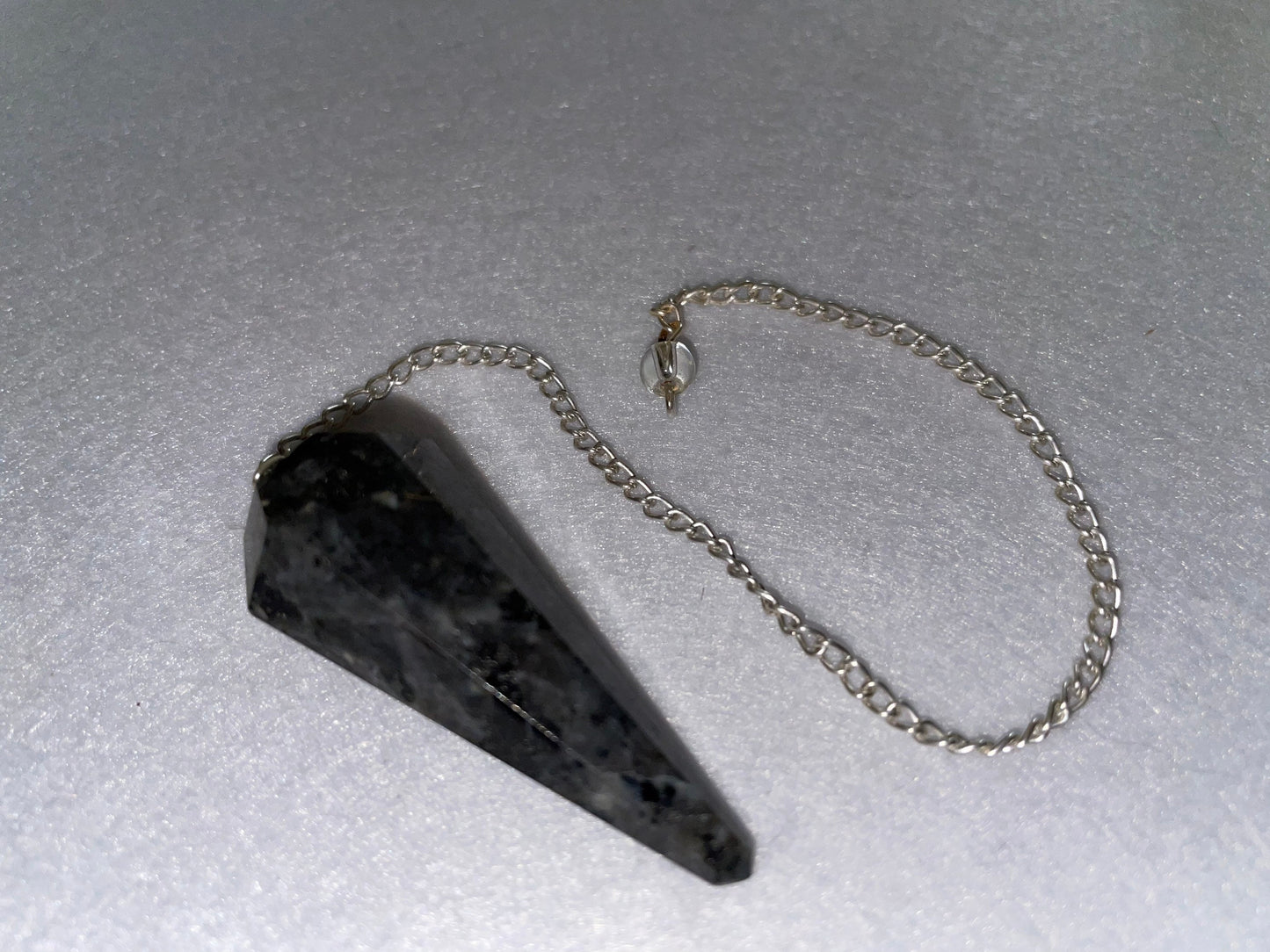 Very nice Labradorite pendulum is  1.75” and with chain is 9.25 protective psychic crystal