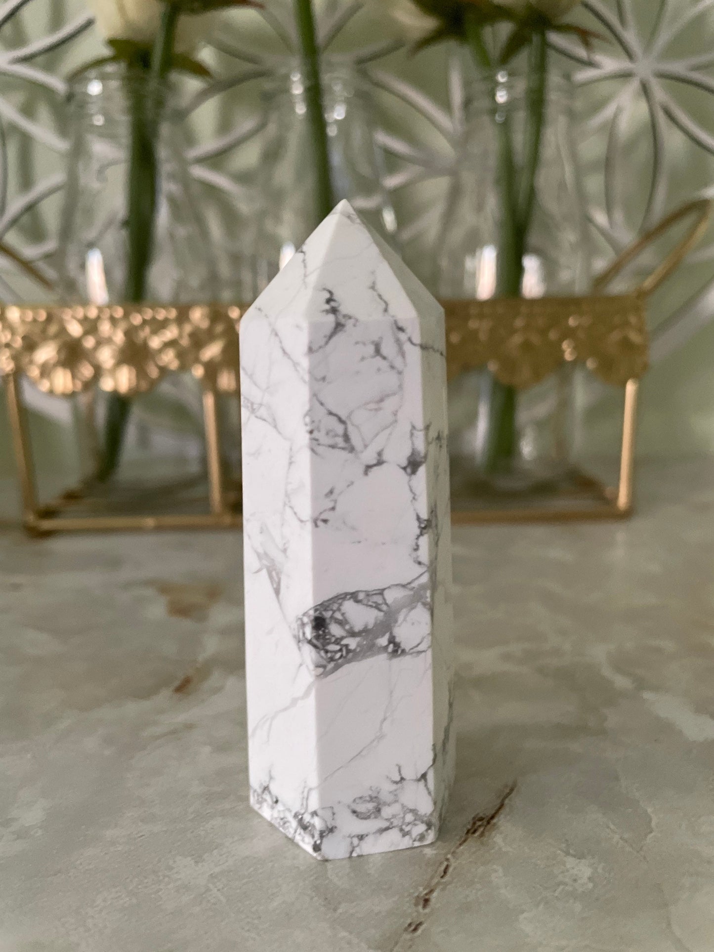 Howlite point crystal with beautiful cuts