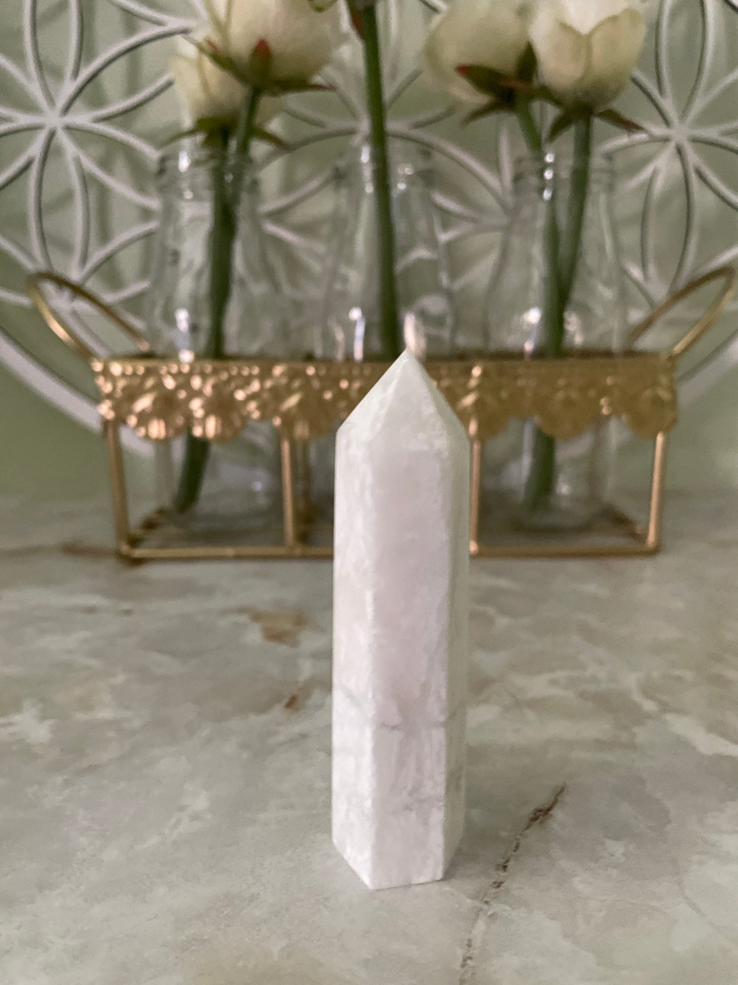 Gorgeous Howlite point crystal with beautiful cuts 3.13 inches