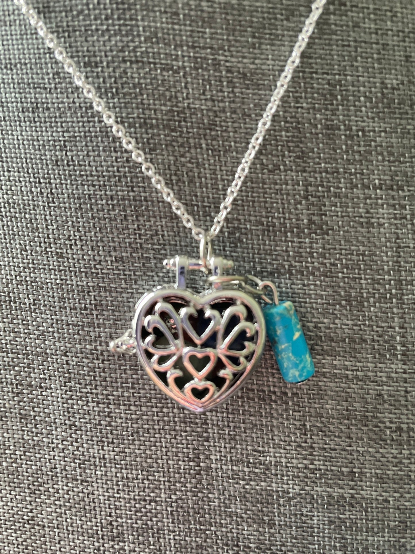 Beautiful Stainless steel silver chain locket filled with crystals With turquoise accent 16+”