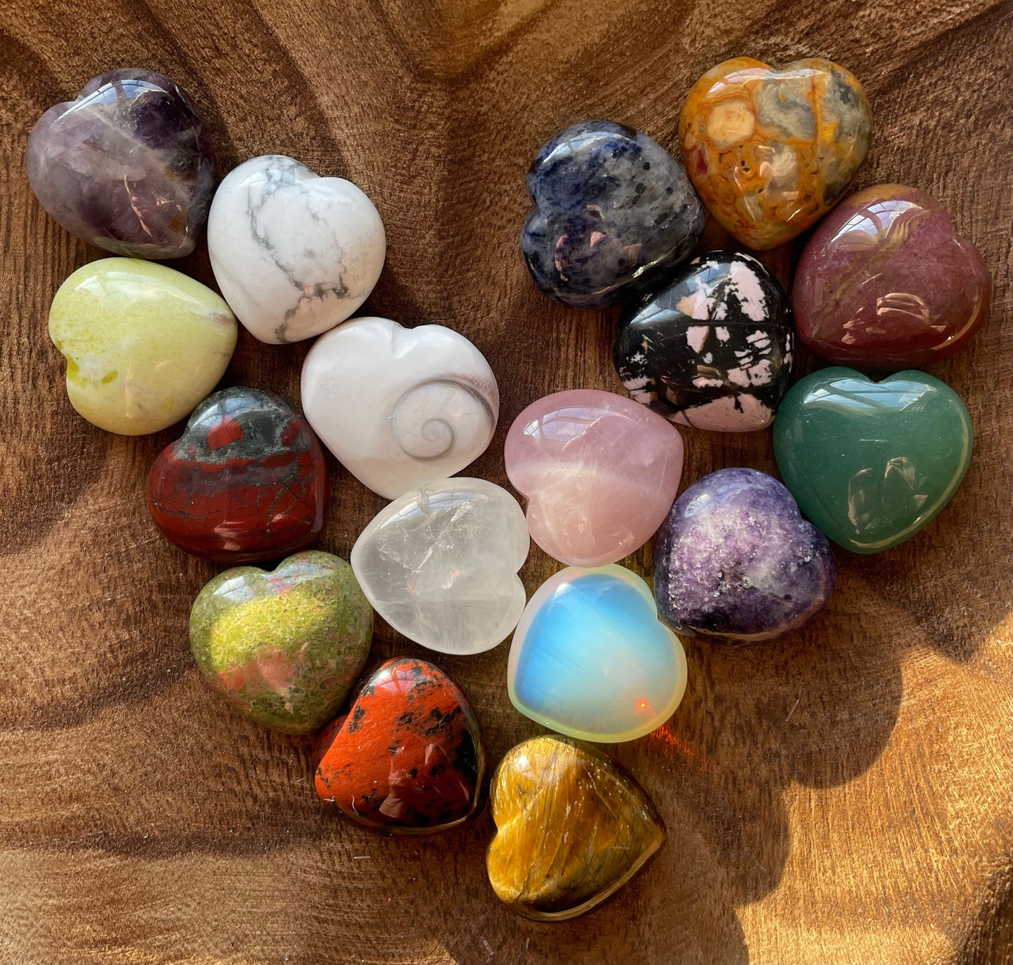 Large variety of Pretty crystal hearts Amethyst Opalite Tigers eye Aventurine Rose Quartz Howlite Quartz Obsidian and many more!