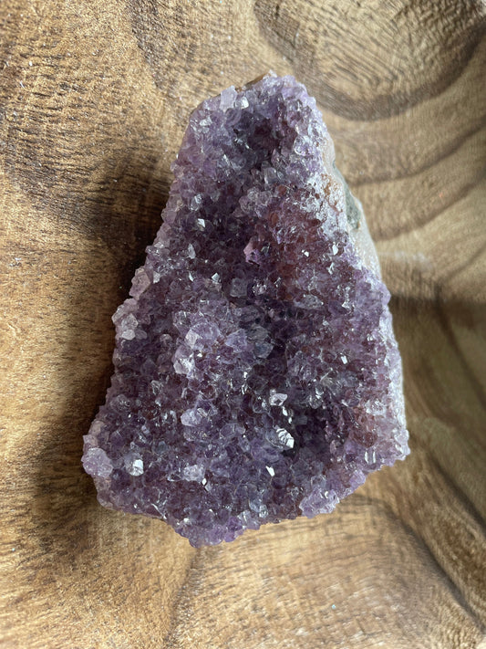 This beautiful Uruguay amethyst cluster is a perfect gift for any Aquarius or February birthday.