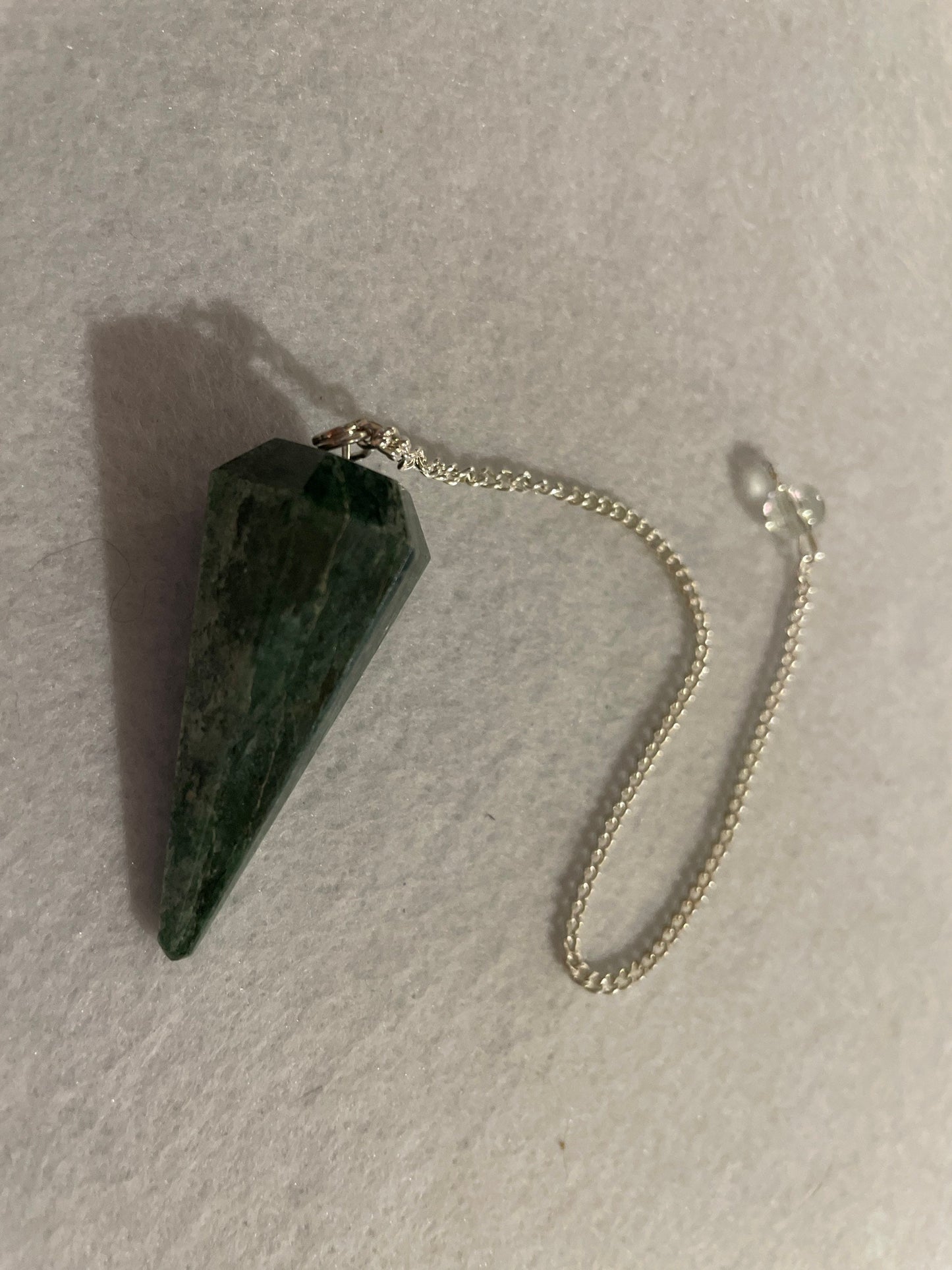 Jade Pendulum is  1.75” and with chain is 8.5”