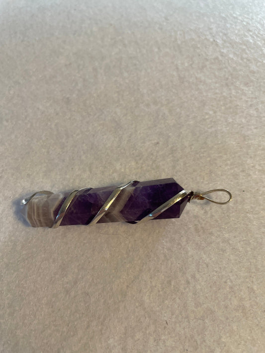 Gorgeous Banded Amethyst Point Pendant is just over 2” and is wrapped in precious silver