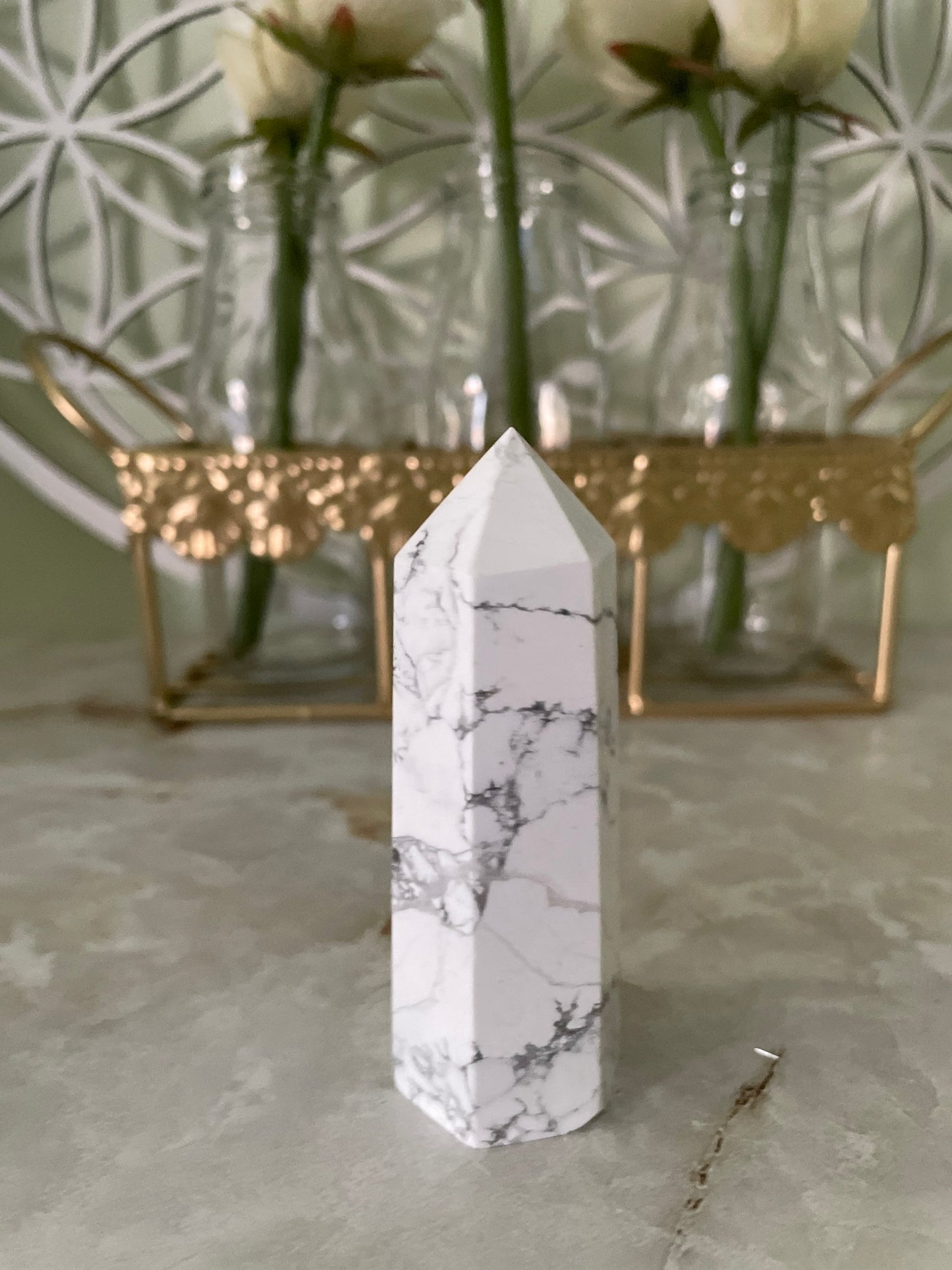 Howlite point crystal with beautiful cuts