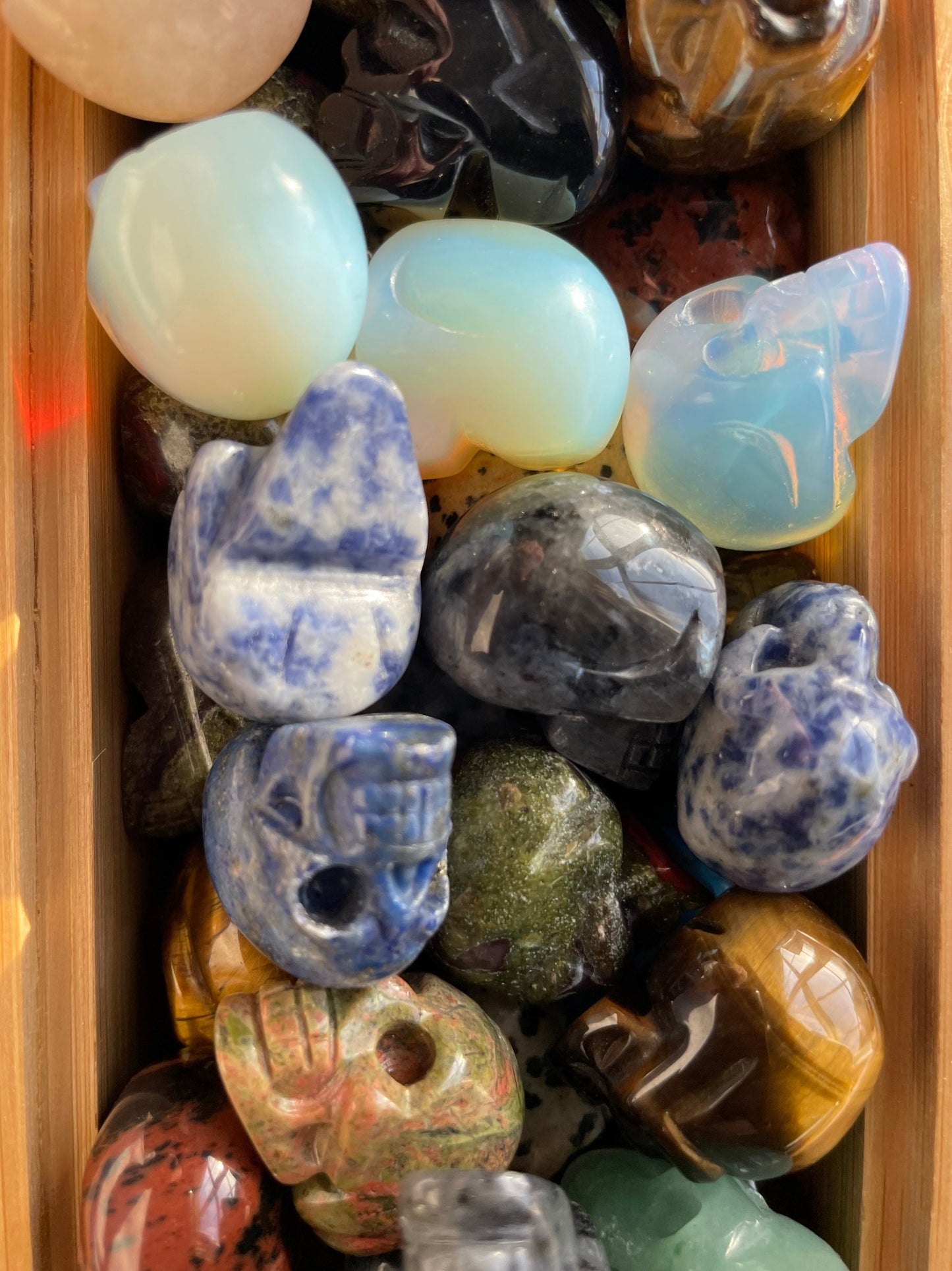 Crystal skulls! Various stones and crystal types Rose quartz opal lite sodalite Unakite Tigers eye obsidian aventurine Agate Jasper