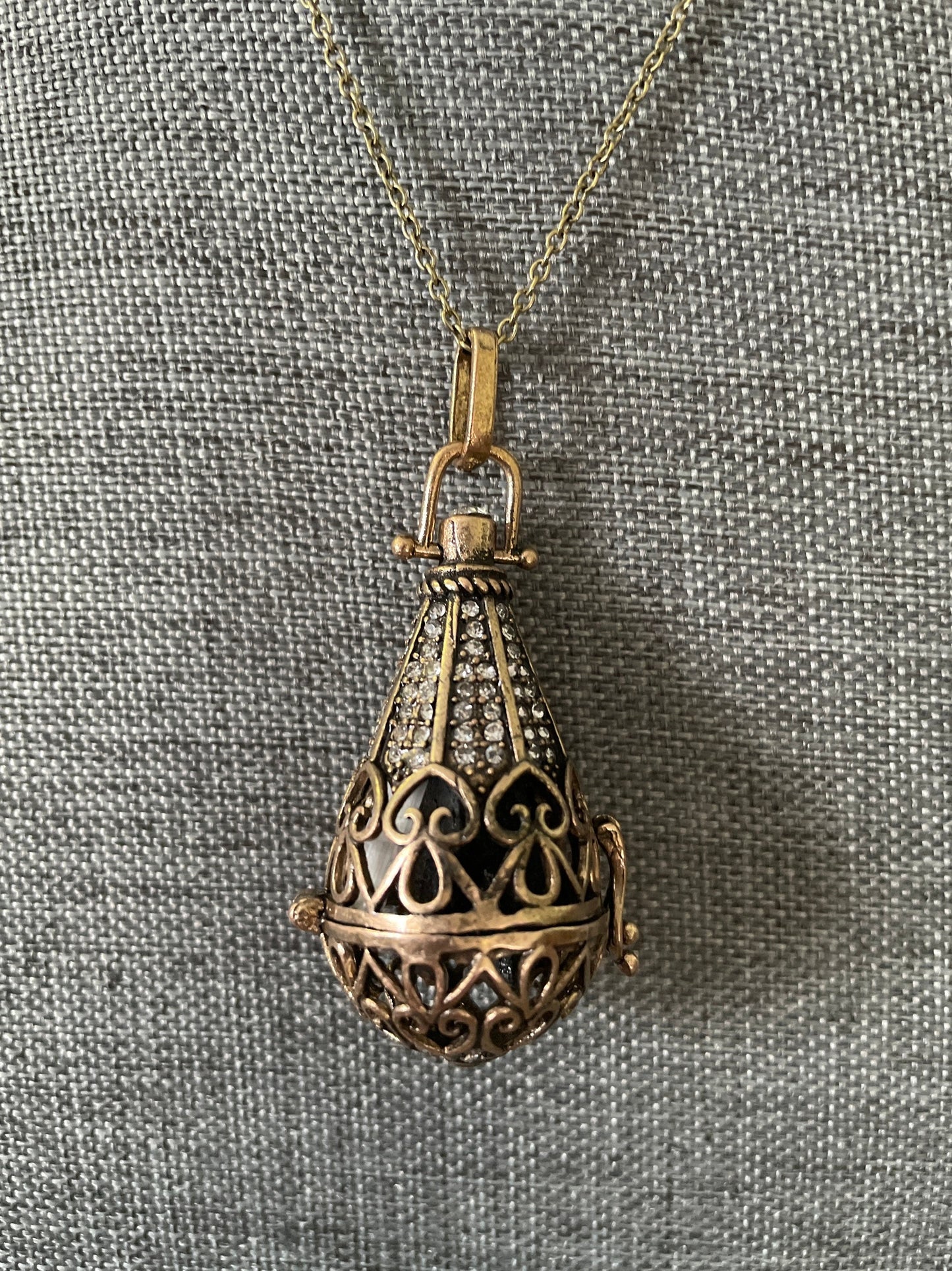 Antique Gold locket with 6 interchangeable crystals on 16” antique gold chain