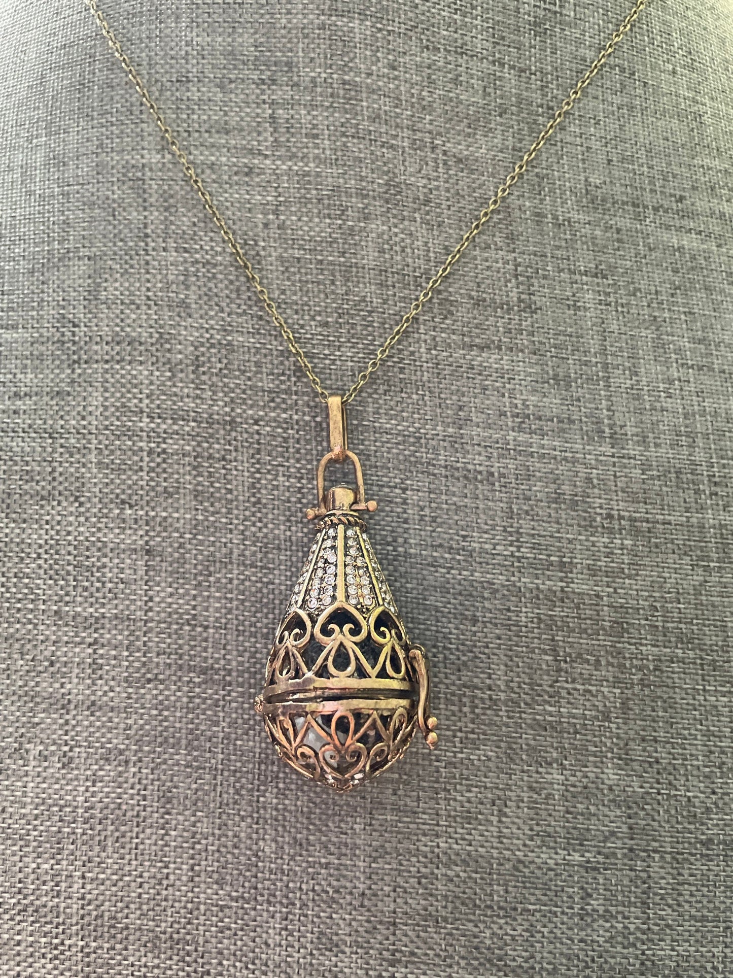 Antique Gold locket with 6 interchangeable crystals on 16” gold chain