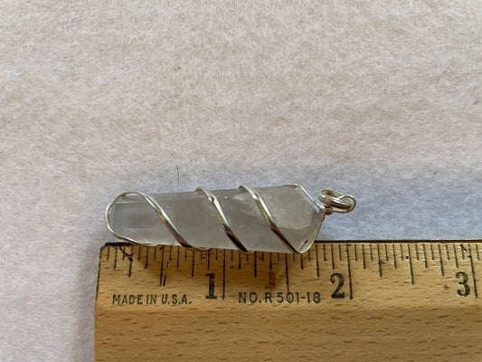 Beautiful Clear Quartz Point Pendant is  1.65” and is attached to precious silver making the total length 2”