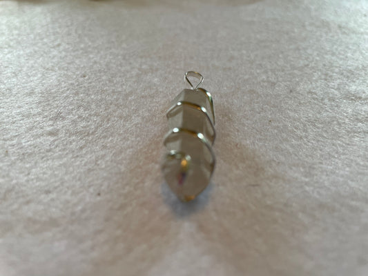 Beautiful Clear Quartz Point Pendant is  1.50” and is attached to precious silver making the total length 2”