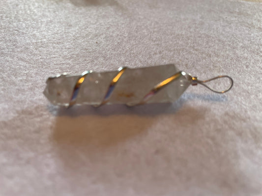 Beautiful Clear Quartz Point Pendant is  1.75” and is attached to precious silver making the total length 2.25”