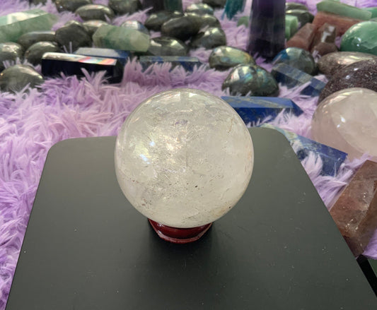 Beautiful 12.5 ounce clear quartz sphere crystal ball with wooden stand