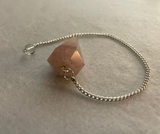 This beautiful Rose Quartz Pendulum is  1.5” and with chain is 8”