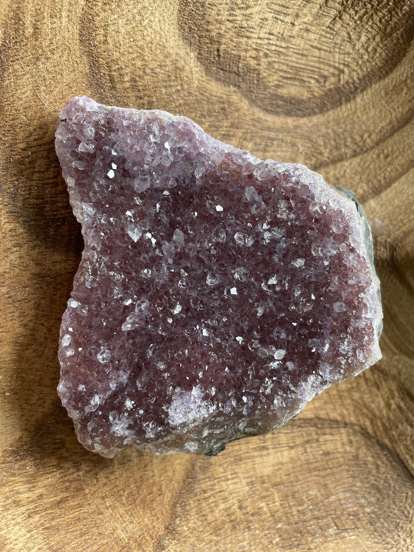 This beautiful Uruguay amethyst cluster is a perfect gift for any Aquarius or February birthday.