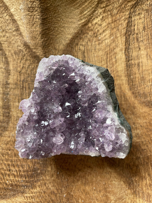 This beautiful baby cathedral Uruguay amethyst cluster is a perfect gift for any Aquarius or February birthday.