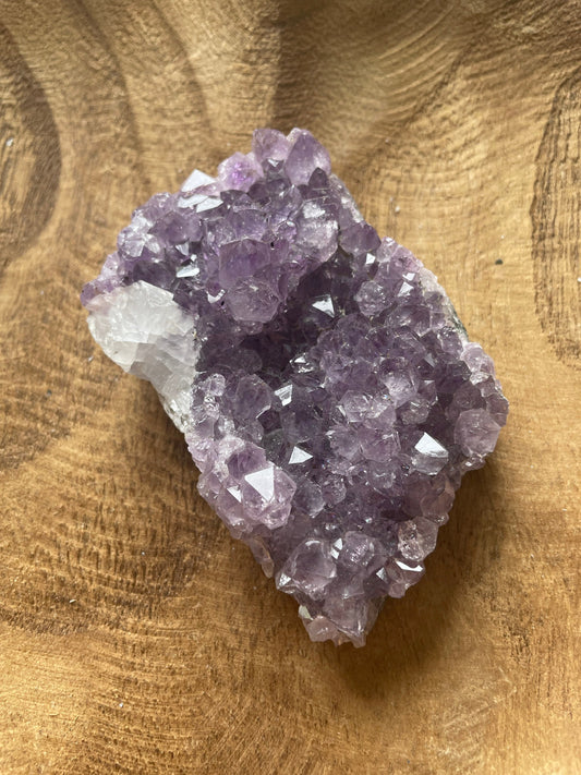 Uruguay amethyst cluster with a bit of Quartz is a perfect gift for any Aquarius or February birthday.