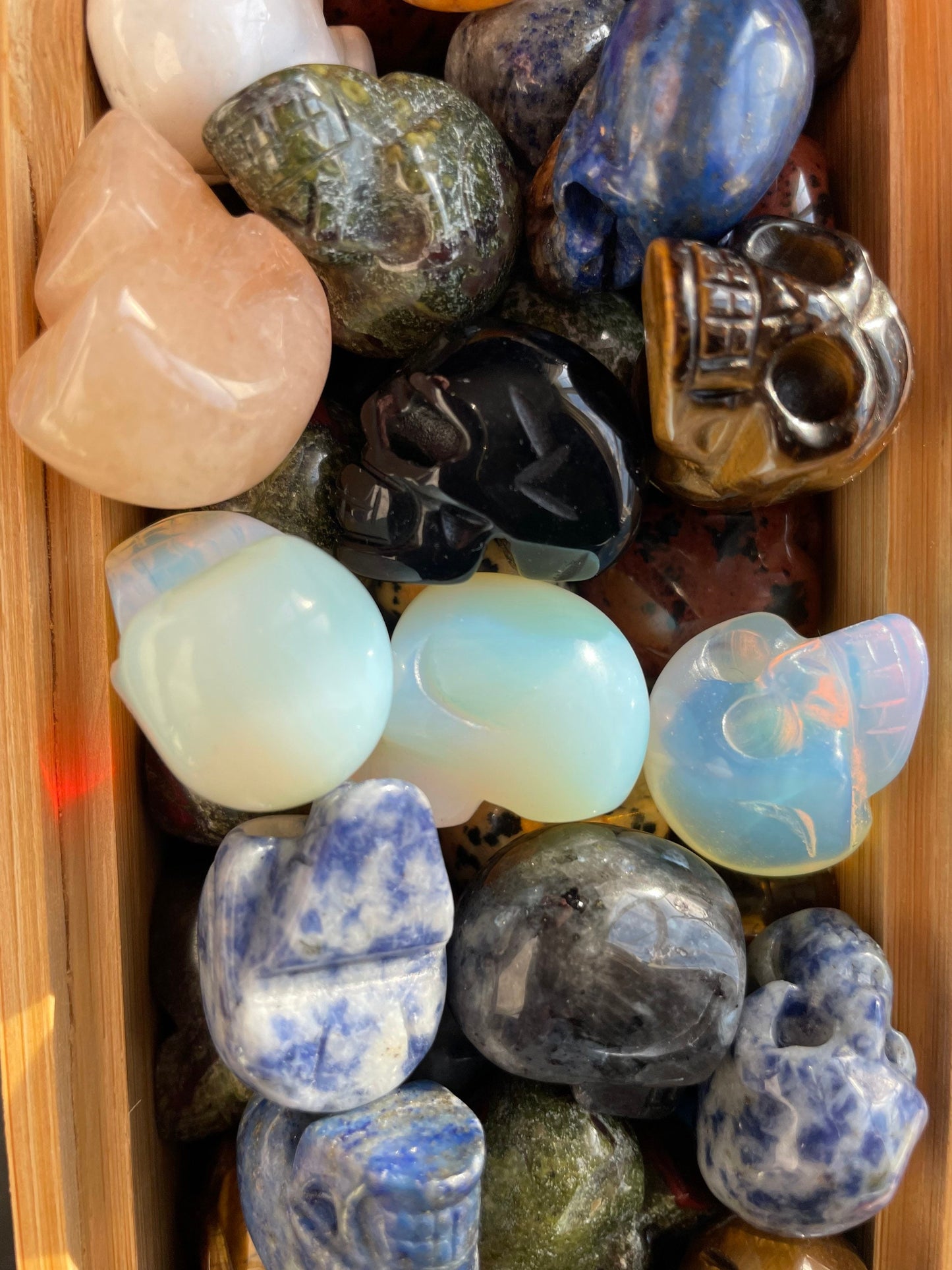 Crystal skulls! Various stones and crystal types Rose quartz opal lite sodalite Unakite Tigers eye obsidian aventurine Agate Jasper