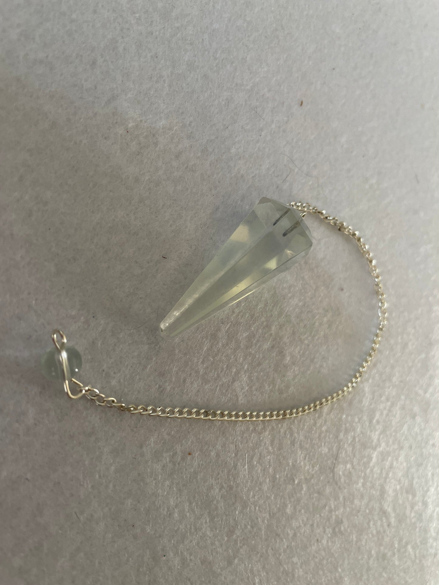 Beautiful Opalite pendulum is approximately 1.5” and with chain is 8.25” total length.
