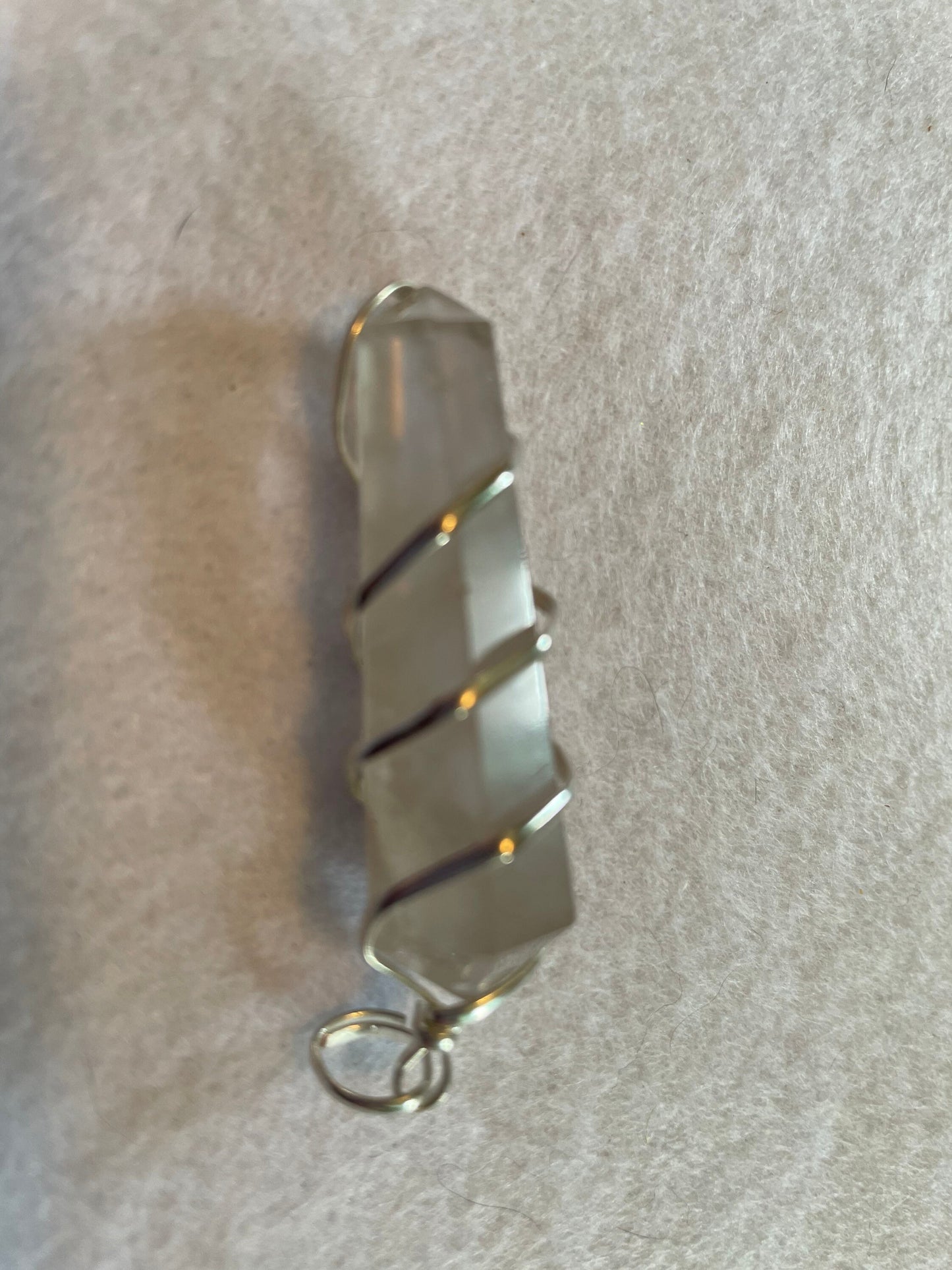 Beautiful Clear Quartz Point Pendant is  1.65” and is attached to precious silver making the total length 2”