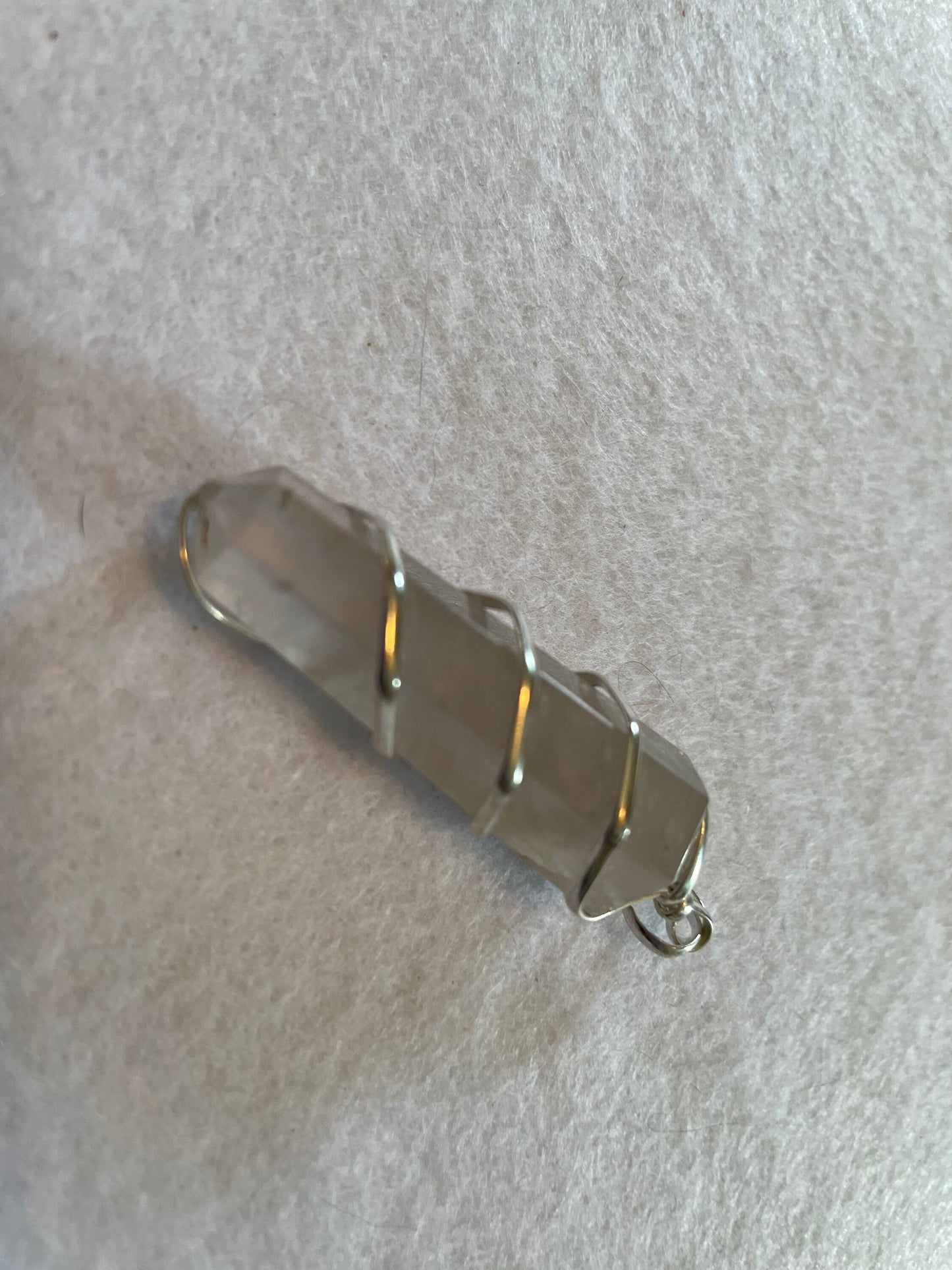 Beautiful Clear Quartz Point Pendant is  1.65” and is attached to precious silver making the total length 2”