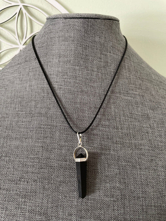 Beautiful black obsidian point pendant necklace wrapped in silver on a black nylon cord
