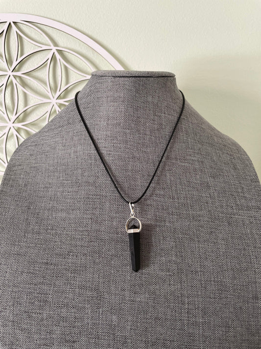 Beautiful black obsidian point pendant necklace wrapped in silver on a black nylon cord