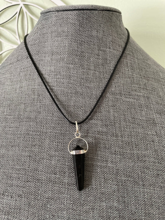 Super sharp looking black obsidian point necklace on black cord
