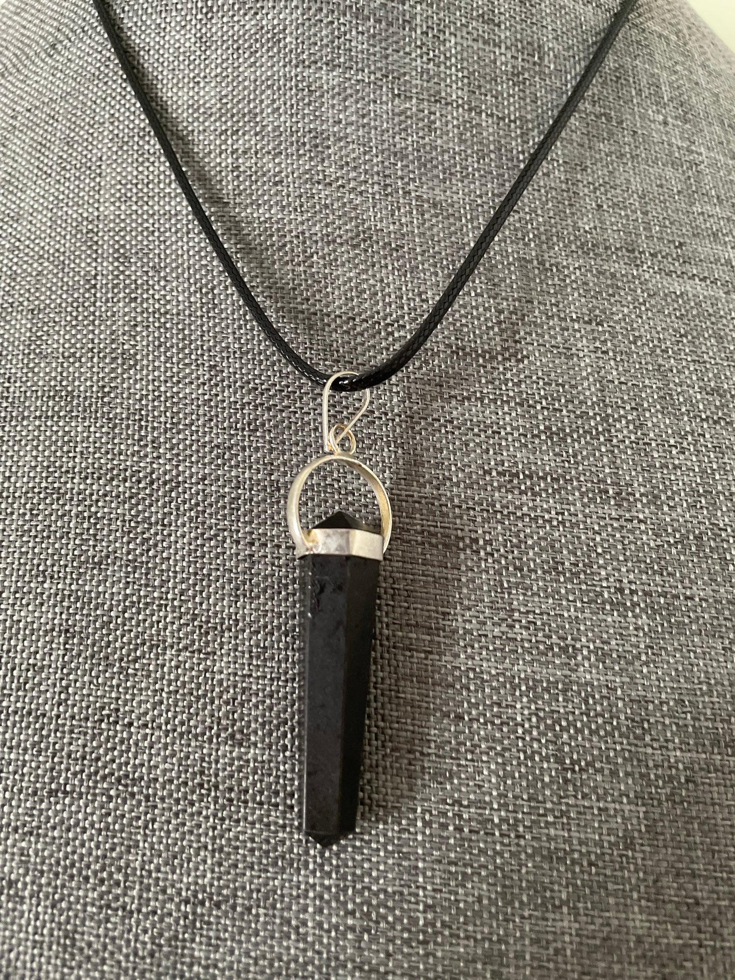 Gorgeous black obsidian point pendant wrapped with silver on a nylon cord