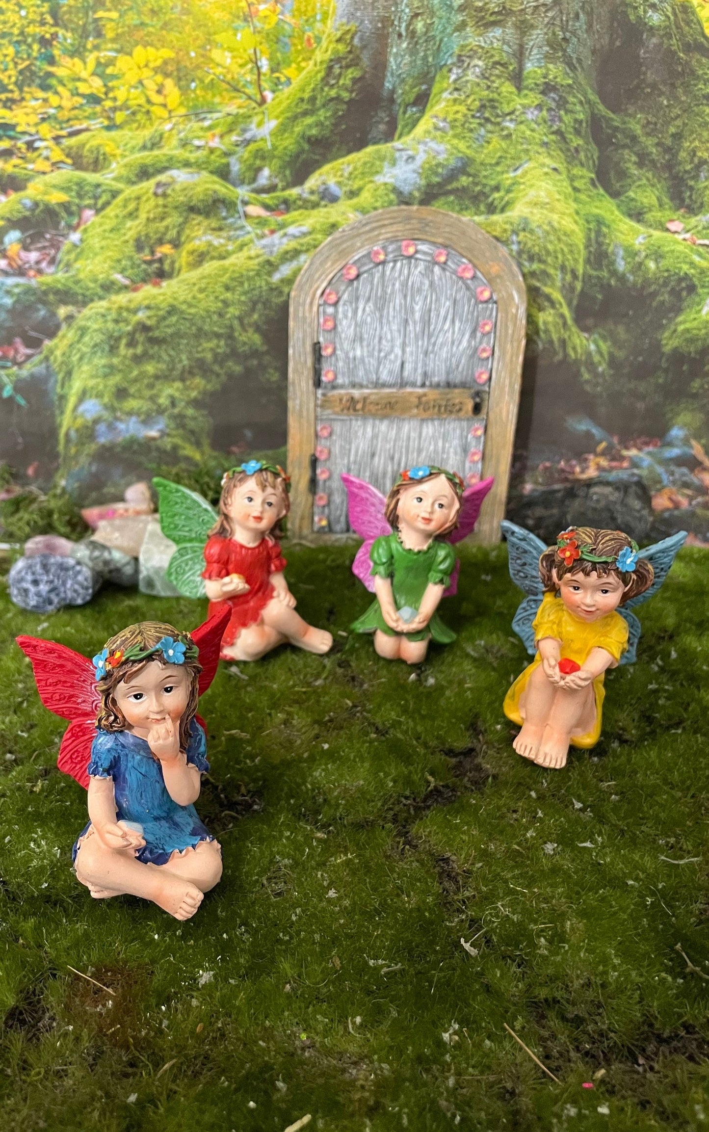 Just look at these sweet faces! Set of 4 miniature fairy garden fairy holding a cute gem