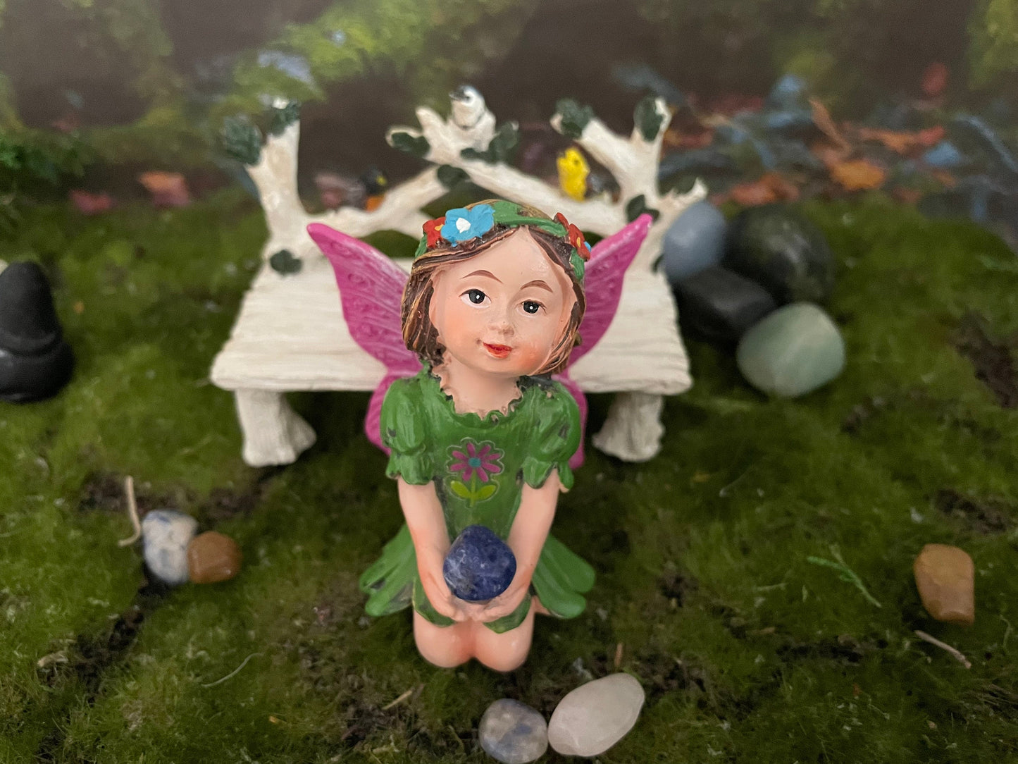 Look at her sweet face and she’s holding an Aventurine crystal hand-painted fairy with crystals