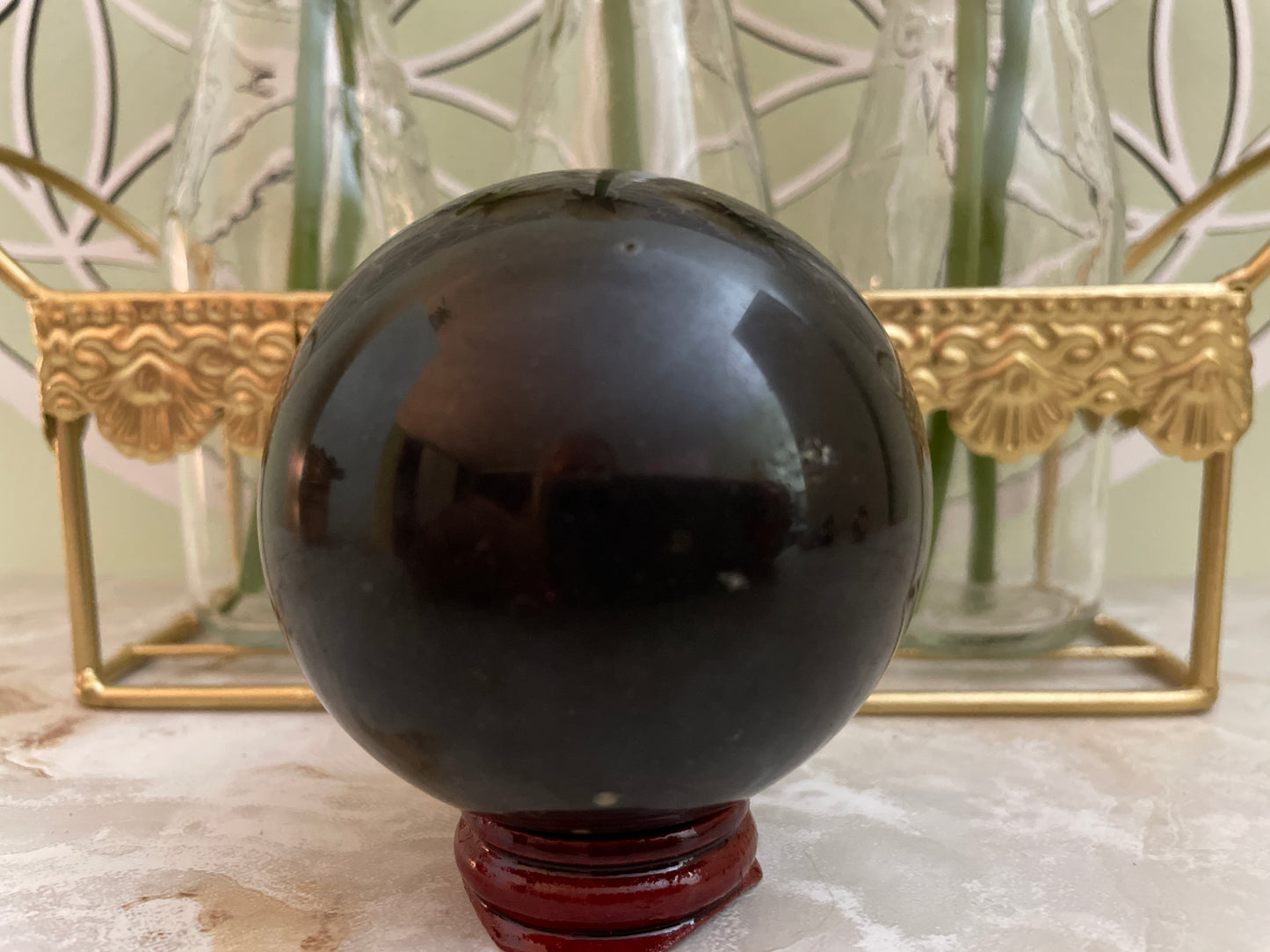 Black Tourmaline sphere weighs over 1 pound