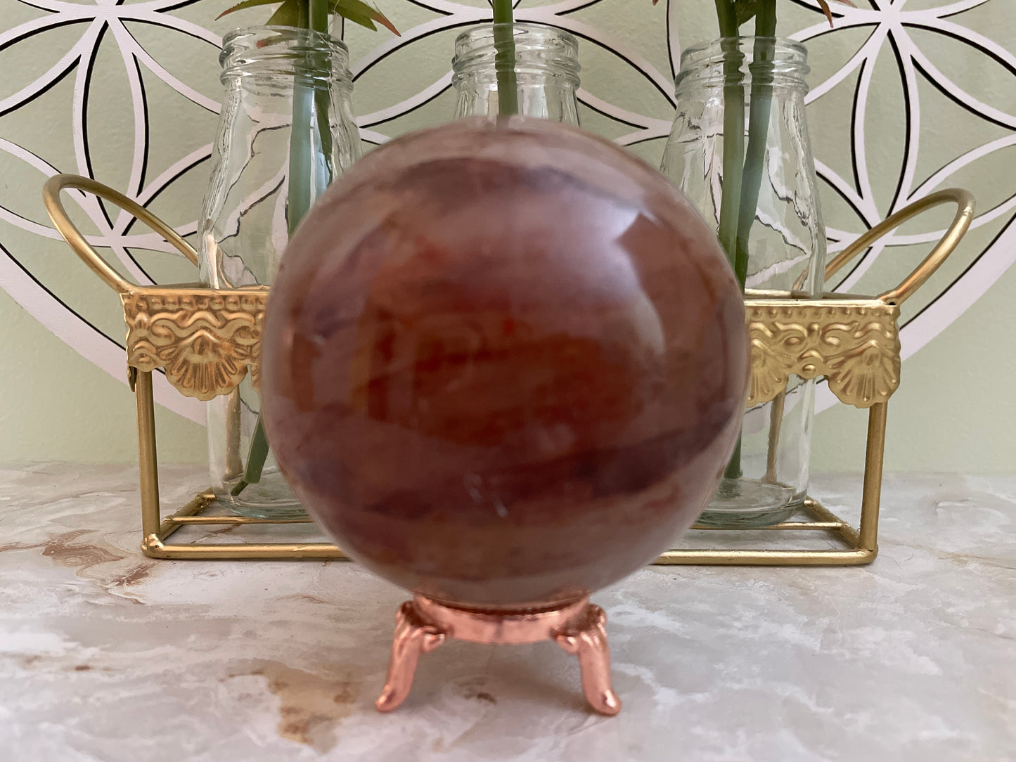 Beautiful specimen of Fire Quartz Sphere weighs just under 2 pound