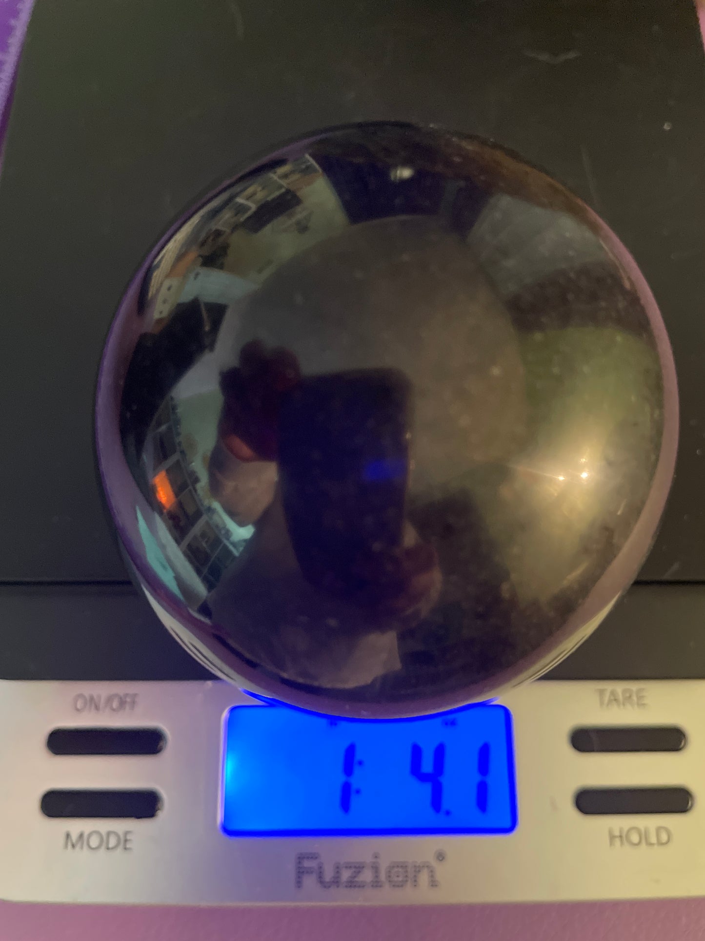 Black Tourmaline sphere weighs over 1 pound