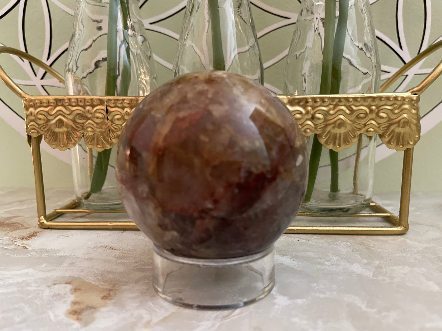 Beautiful specimen of Fire Quartz Sphere weighs just under 1 pound